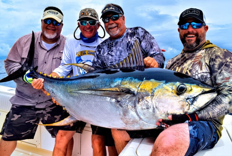 4-anglers-with-yellowfin-tuna